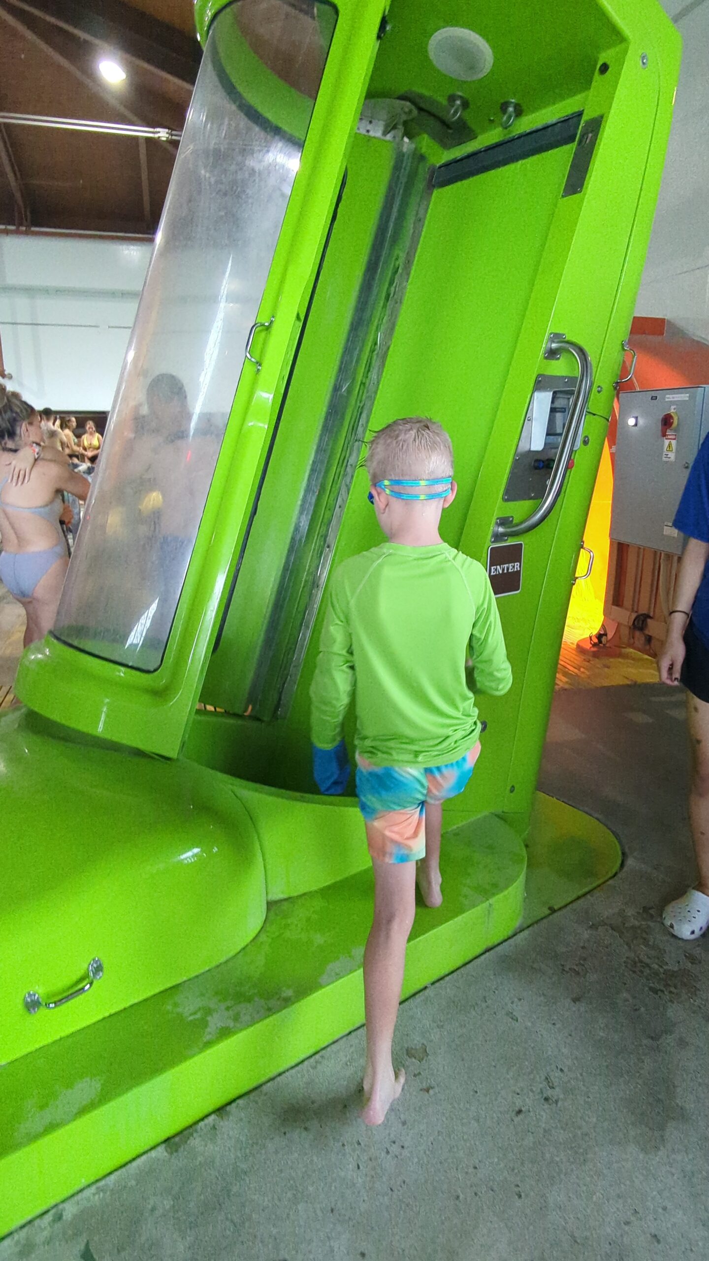 My eldest gets ready to enter a slide in the indoor water park.